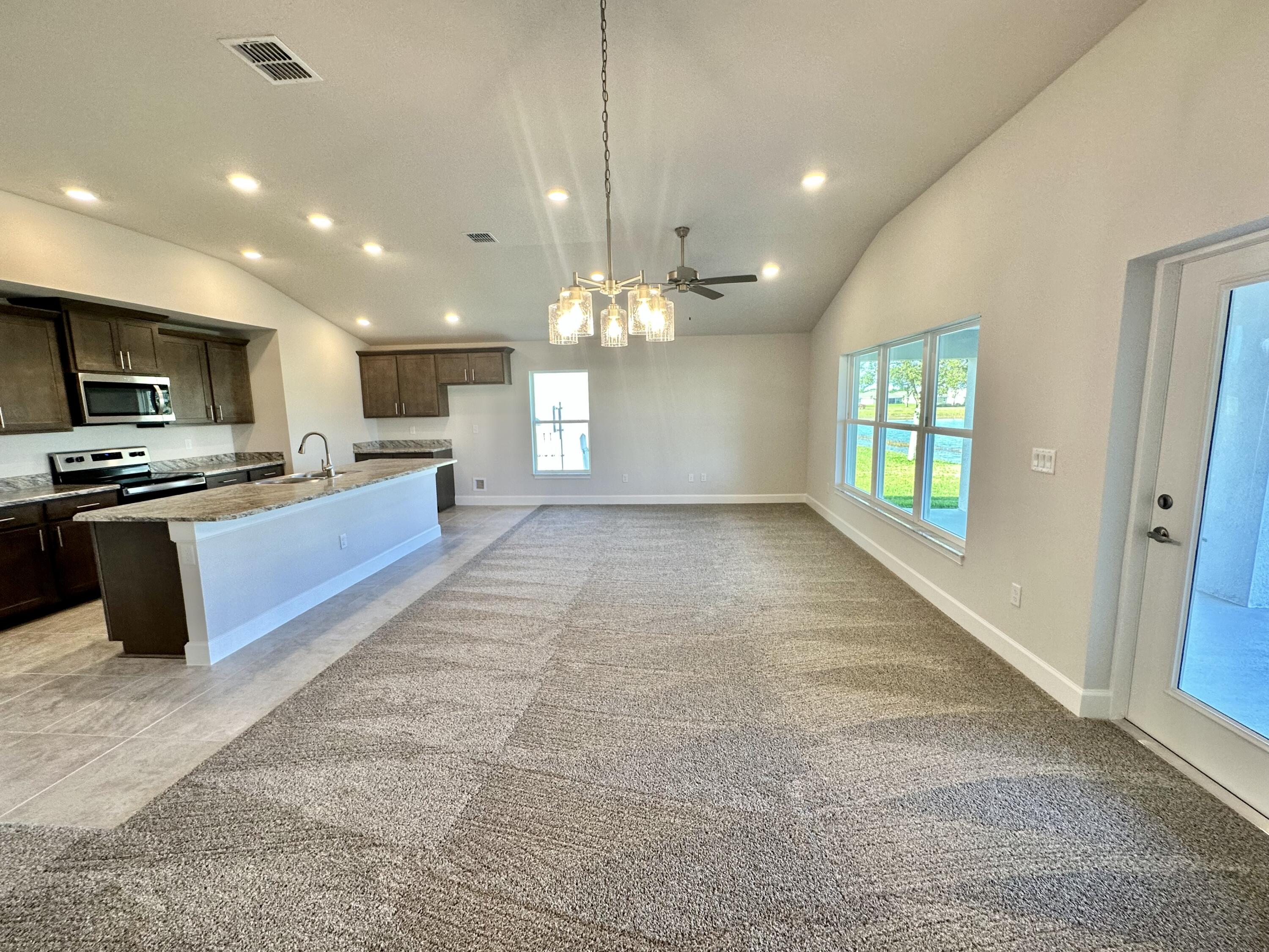 8633 Modeno Street Fort Pierce, FL 34951 - Photo 12 of 33 Family Room?Kitchen