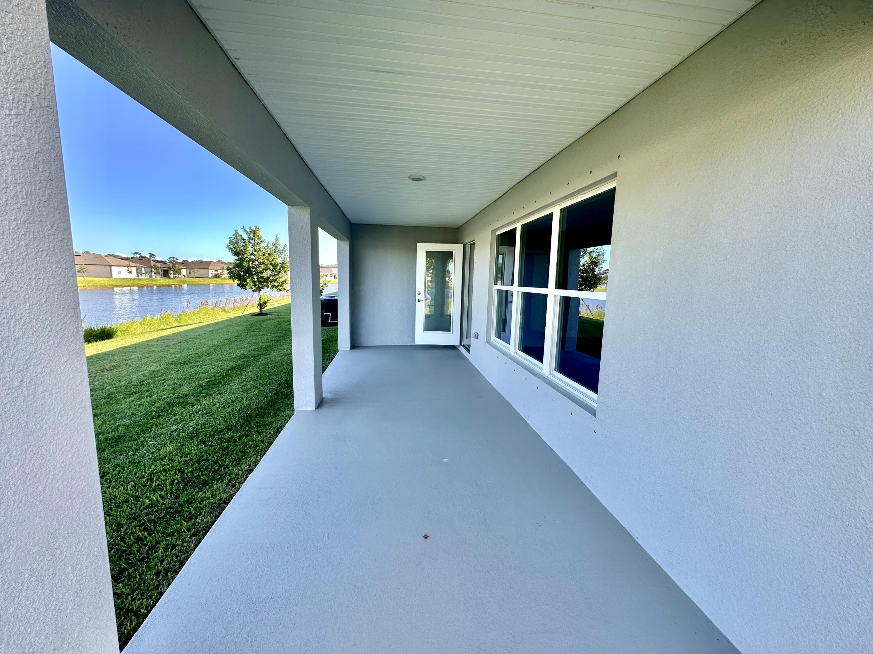 8633 Modeno Street Fort Pierce, FL 34951 - Photo 19 of 33 Covered Porch