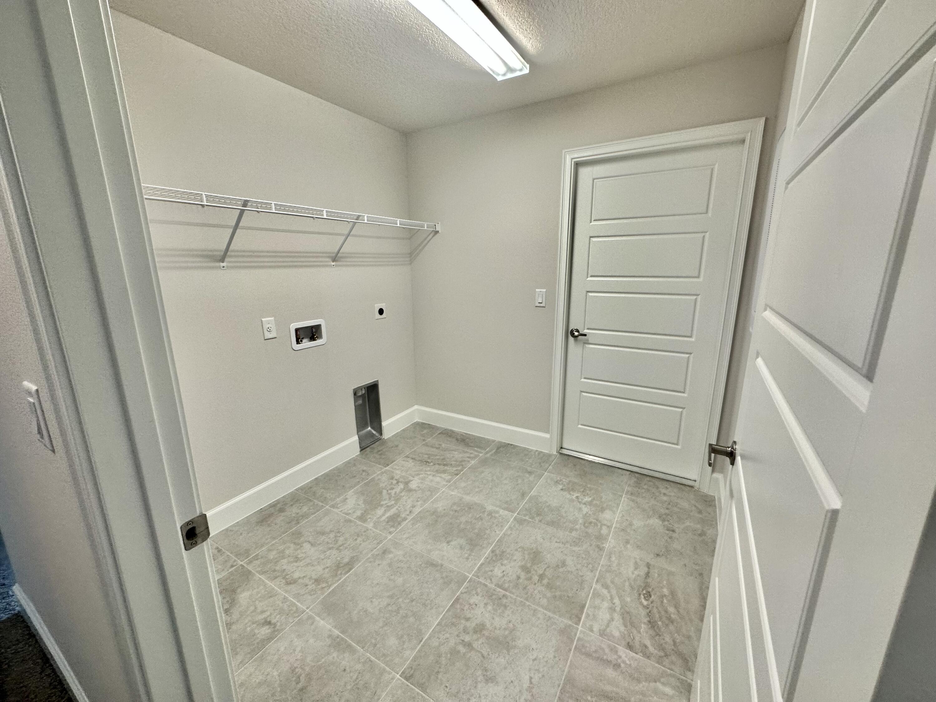 8633 Modeno Street Fort Pierce, FL 34951 - Photo 8 of 33 Laundry