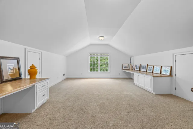 a view of a house with a roof deck