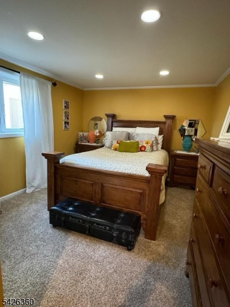 2837 Myrtle Terrace Linden, NJ 07036 - Photo 14 of 15 a bedroom with a bed and a dresser