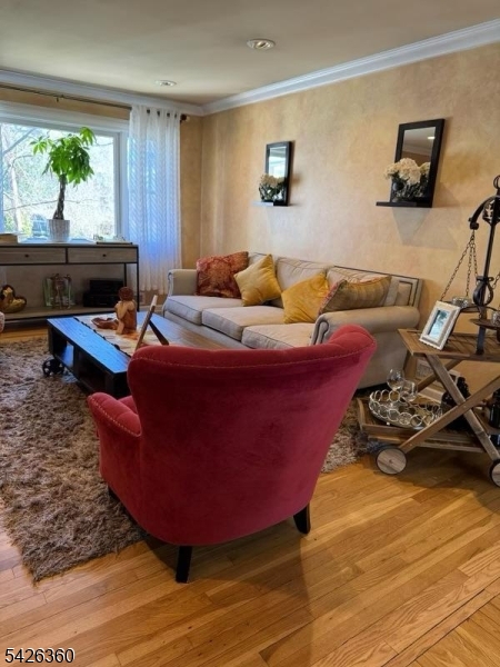 2837 Myrtle Terrace Linden, NJ 07036 - Photo 4 of 15 a living room with furniture a window and a potted plant