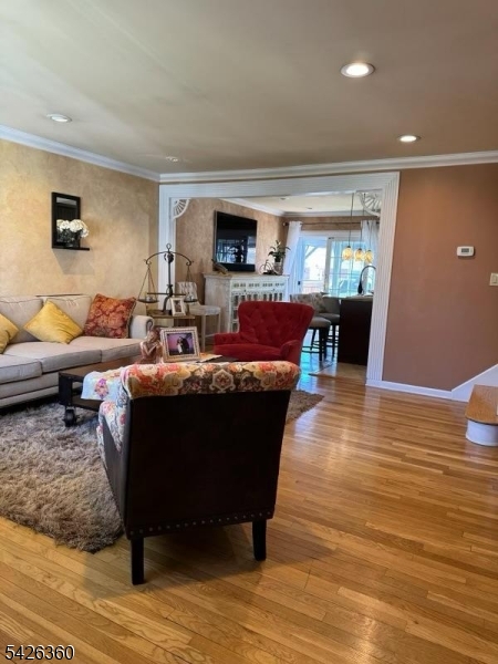 2837 Myrtle Terrace Linden, NJ 07036 - Photo 5 of 15 a living room with furniture and a wooden floor