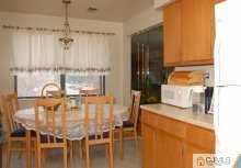 1425 Raspberry Court Edison, NJ 08817 - Photo 5 of 8 a dining room with furniture and wooden floor