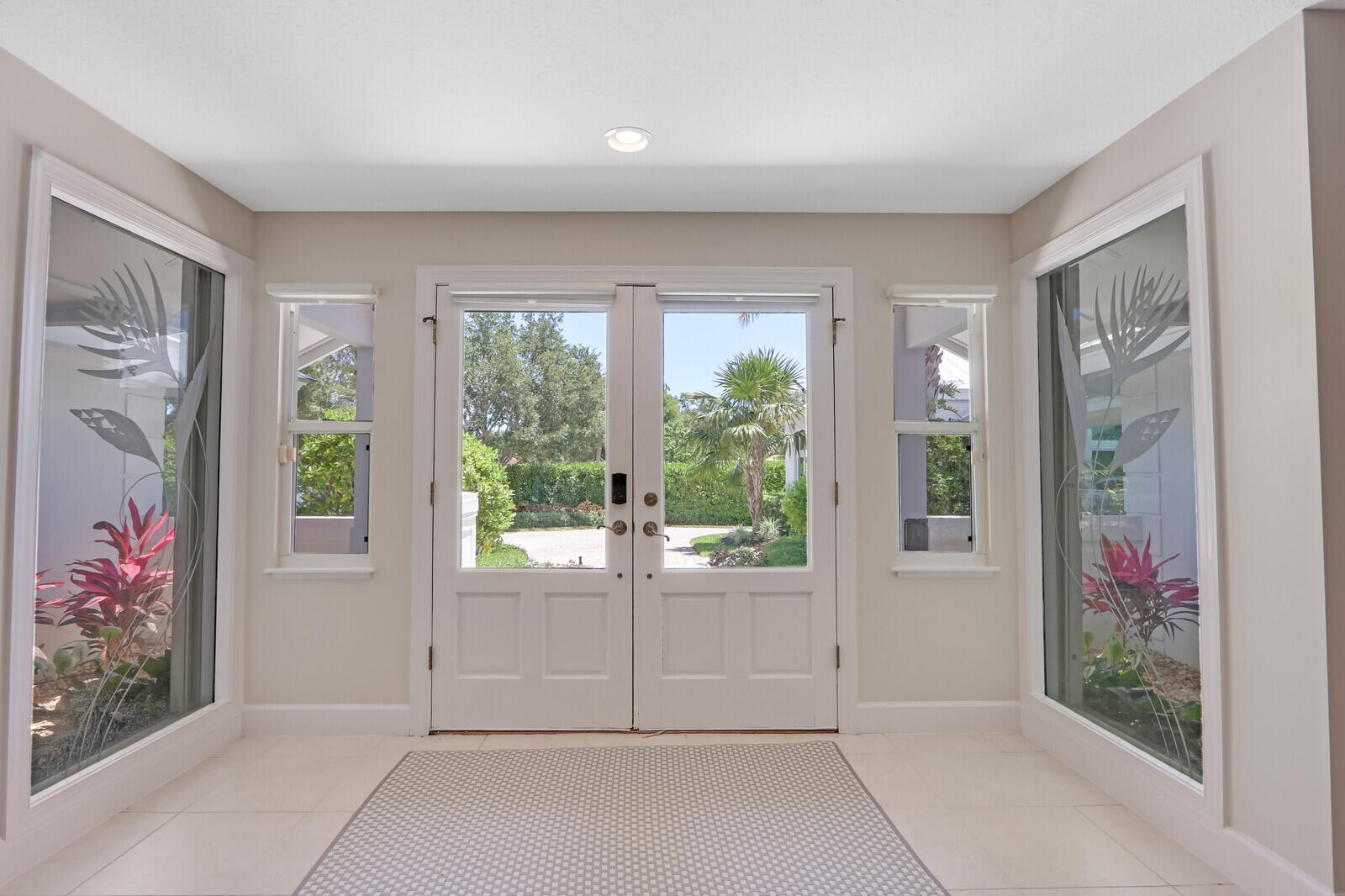11 North River Road Sewall's Point, FL 34996 - Photo 11 of 67 wooden floor in an empty room with a window