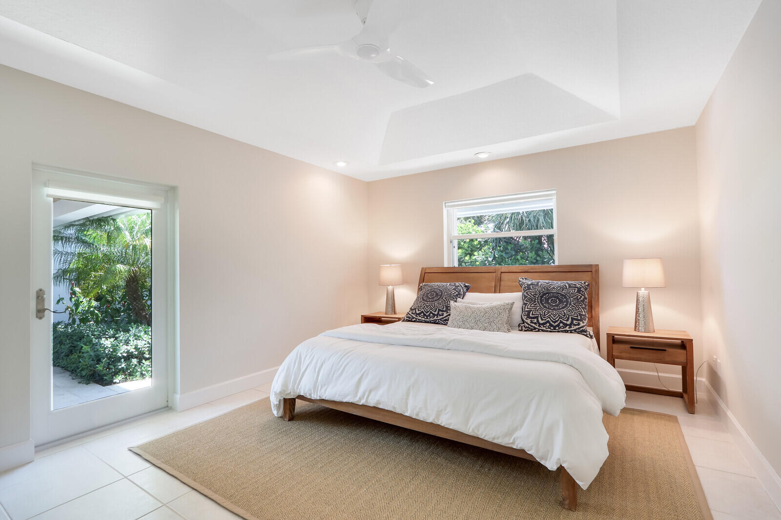 11 North River Road Sewall's Point, FL 34996 - Photo 31 of 67 a bedroom with a bed and a window