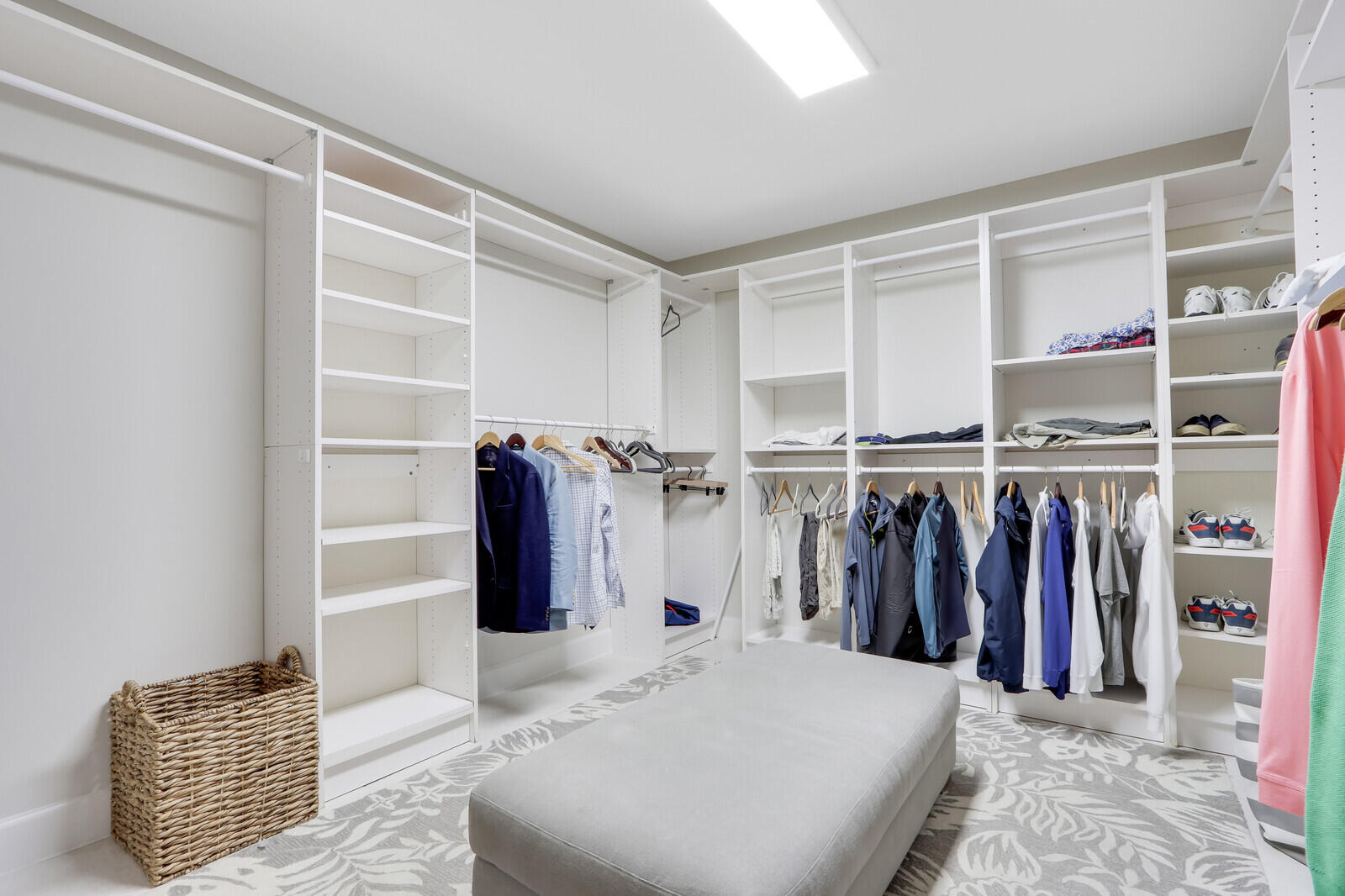 11 North River Road Sewall's Point, FL 34996 - Photo 37 of 67 a walk in closet with a couch