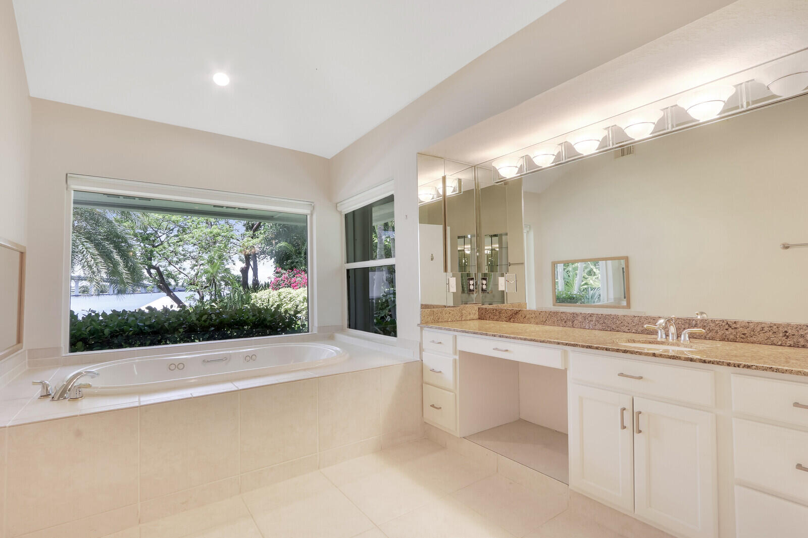 11 North River Road Sewall's Point, FL 34996 - Photo 39 of 67 a large white kitchen with a large window