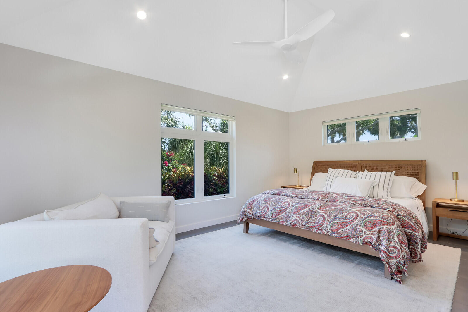 11 North River Road Sewall's Point, FL 34996 - Photo 43 of 67 a bedroom with a bed couch and a window