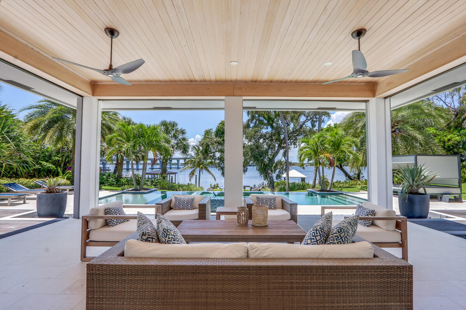 11 North River Road Sewall's Point, FL 34996 - Photo 47 of 67 a living room with furniture and a large window