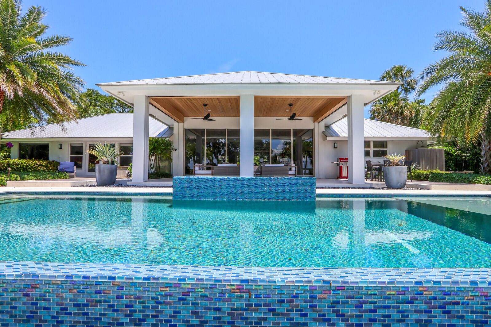 11 North River Road Sewall's Point, FL 34996 - Photo 58 of 67 a view of a house with a swimming pool
