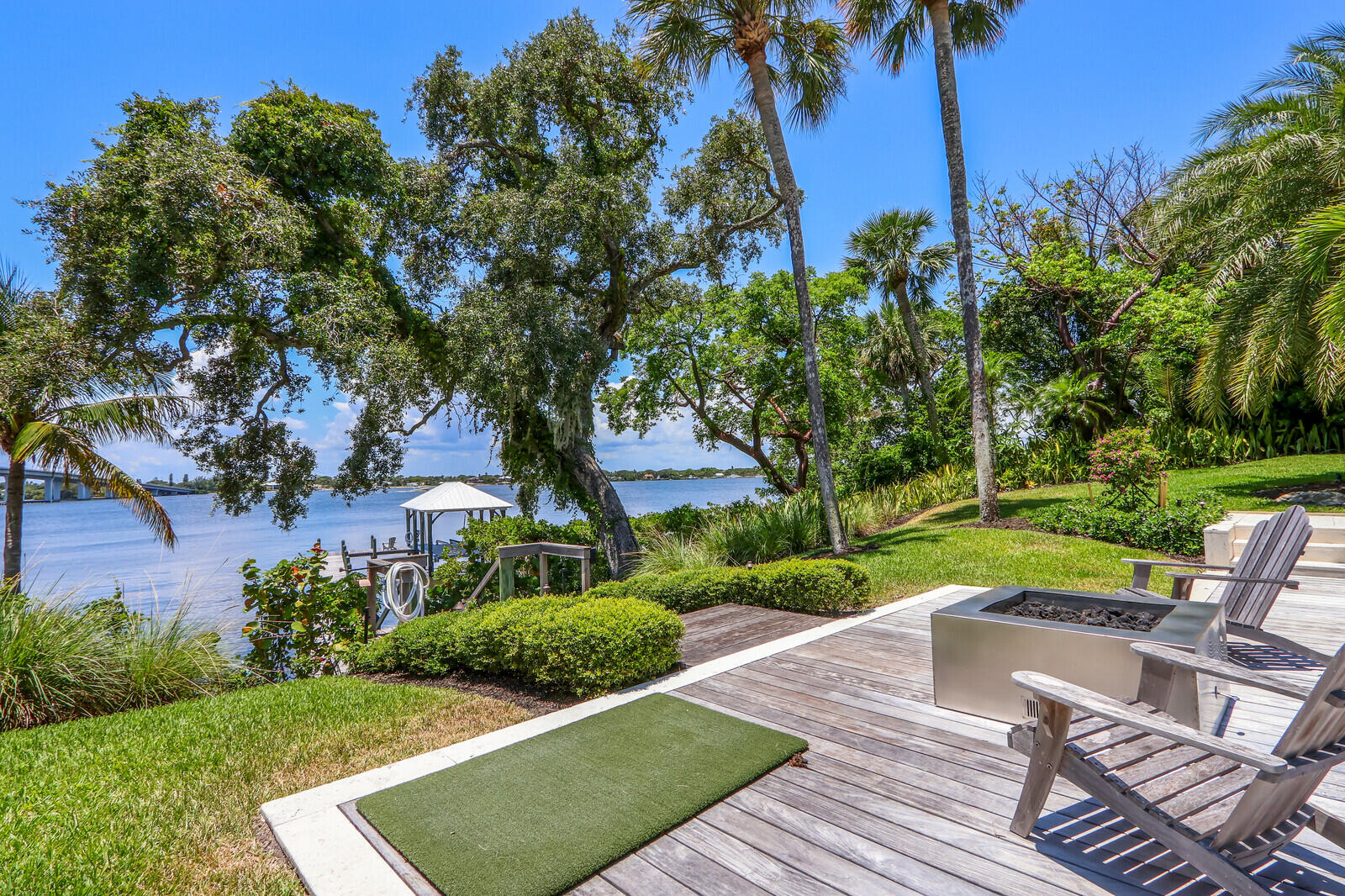 11 North River Road Sewall's Point, FL 34996 - Photo 59 of 67 a view of backyard with swimming pool and green space