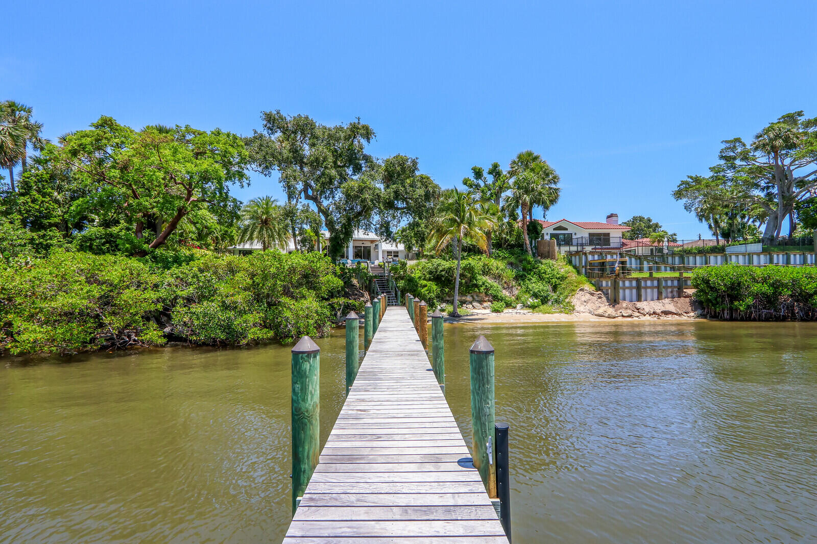11 North River Road Sewall's Point, FL 34996 - Photo 67 of 67 a view of a lake with a large trees