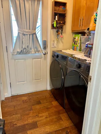 a bathroom with a sink a mirror and shower