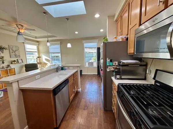 a kitchen with a stove and a microwave