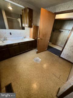 17 Propeller Drive Baltimore, MD 21220 - Photo 13 of 18 a bathroom with a sink and a mirror