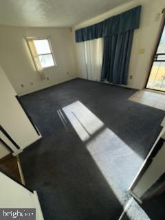 17 Propeller Drive Baltimore, MD 21220 - Photo 4 of 18 a view of an empty room and window