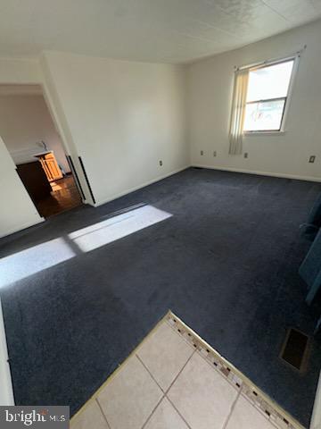 17 Propeller Drive Baltimore, MD 21220 - Photo 5 of 18 a view of an empty room and window