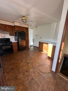 17 Propeller Drive Baltimore, MD 21220 - Photo 8 of 18 a view of an empty room and a kitchen