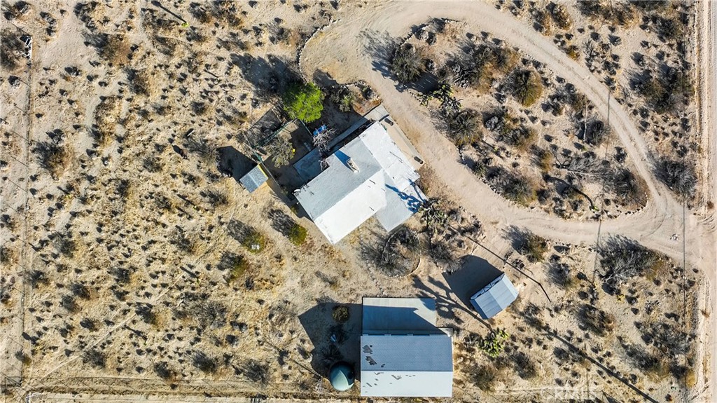 9482 Palomar Trail Lucerne Valley, CA 92356 - Photo 41 of 45 a aerial view of a house with a yard