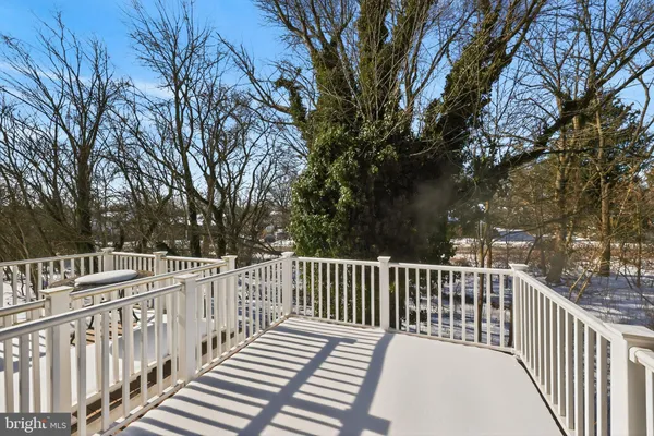 a view of a wooden roof deck