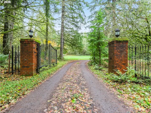 a view of a pathway both side of house