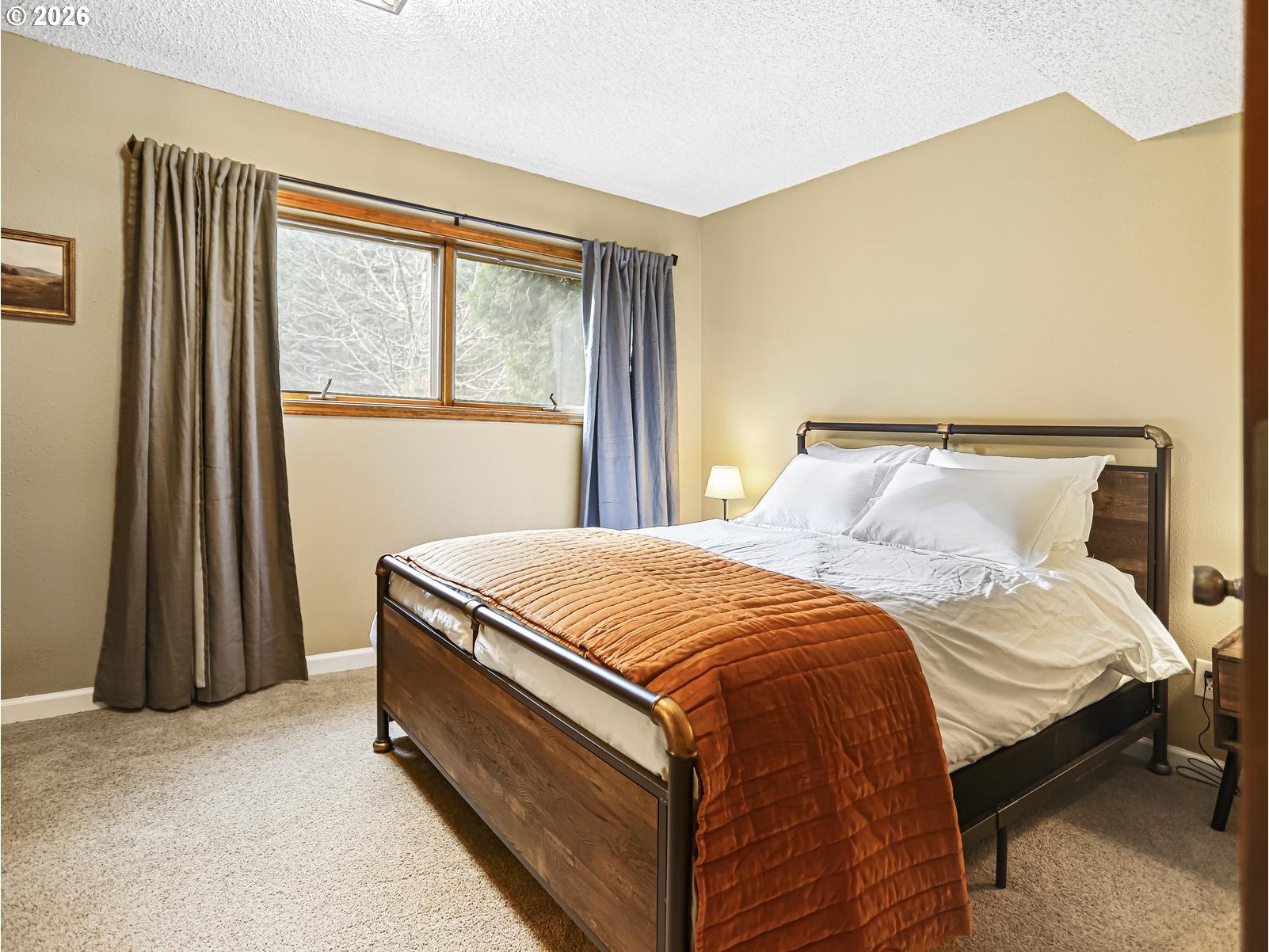 45990 Southeast Jadrny Road Sandy, OR 97055 - Photo 36 of 47 a bedroom with a bed and a window