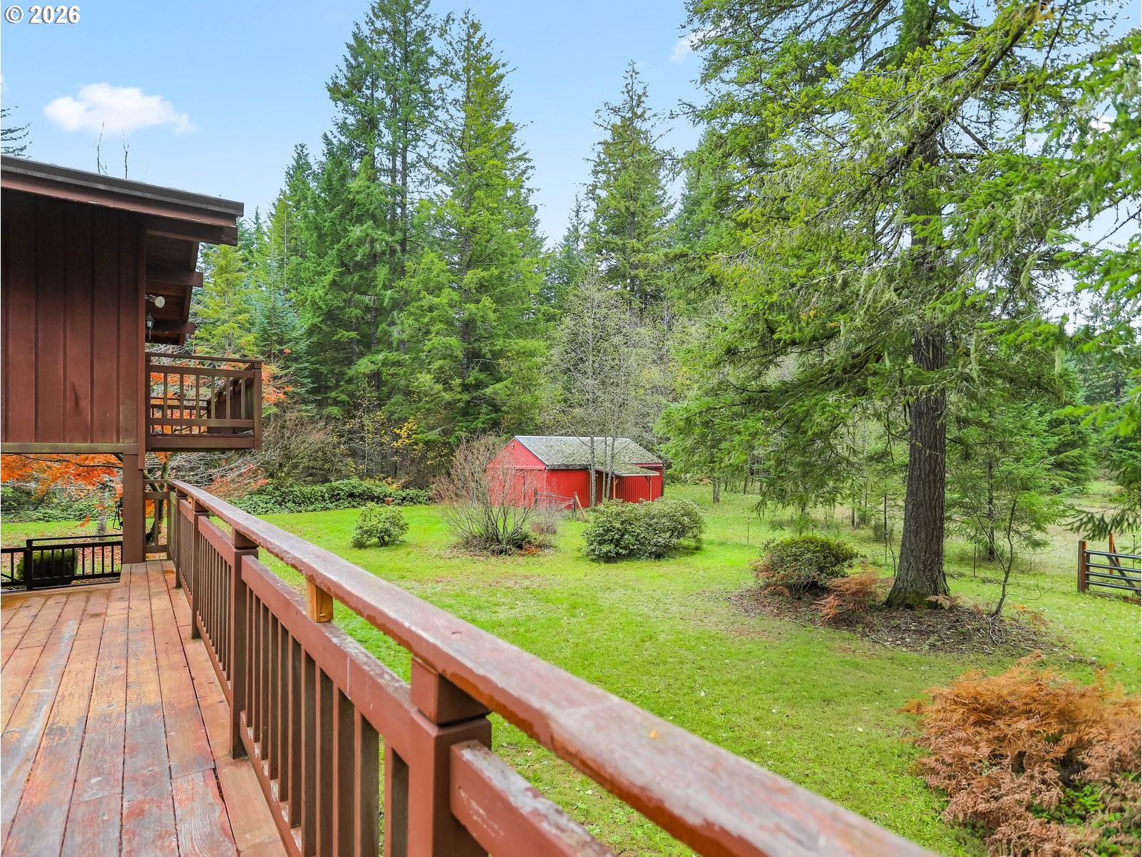 45990 Southeast Jadrny Road Sandy, OR 97055 - Photo 44 of 47 a balcony with wooden floor and outdoor seating