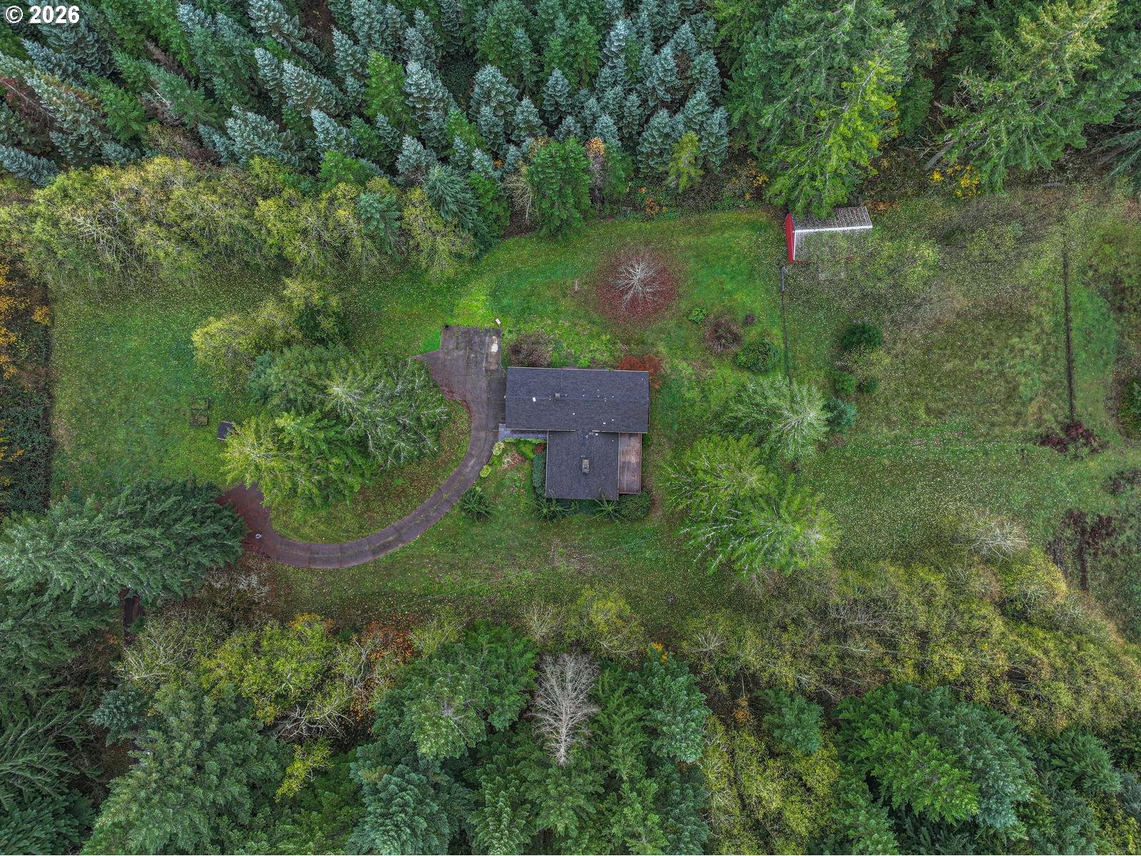 45990 Southeast Jadrny Road Sandy, OR 97055 - Photo 46 of 47 an aerial view of a house with a yard