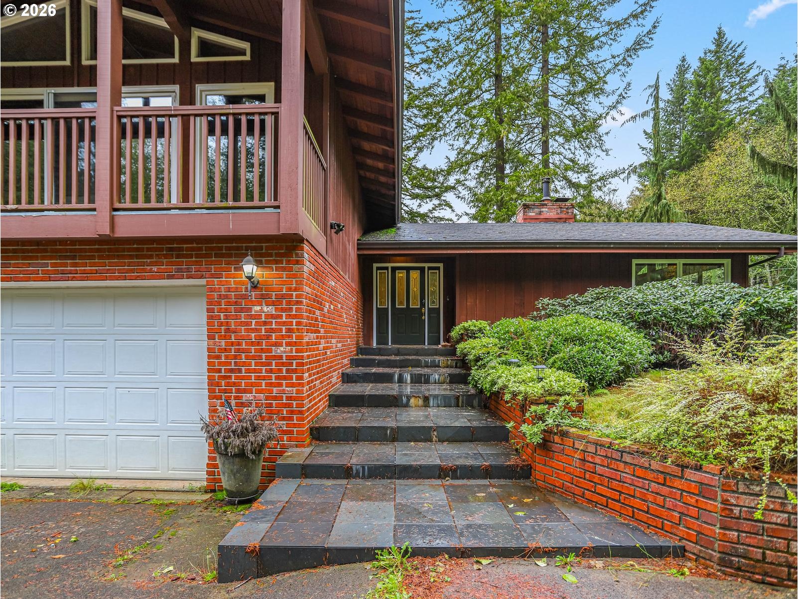 45990 Southeast Jadrny Road Sandy, OR 97055 - Photo 5 of 47 a view of a house with potted plants