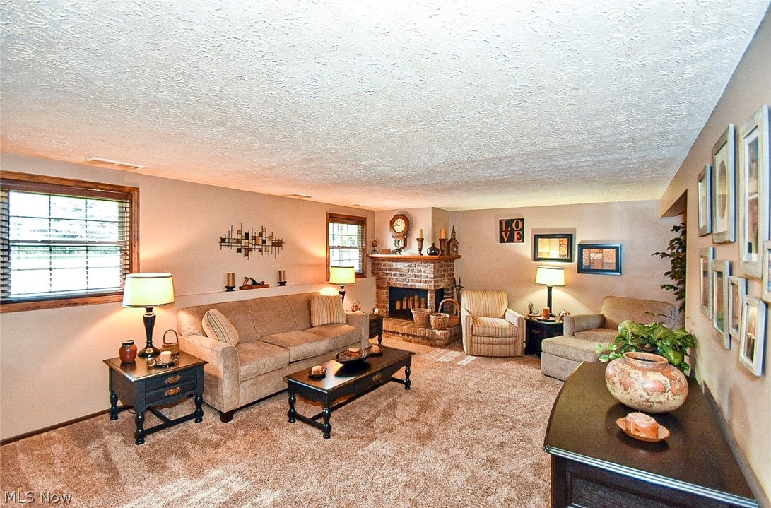 680 Pontius Road Mogadore, OH 44260 - Photo 25 of 35 680 Pontius St NW, Mogadore, OH 44260 lower level entertaining.