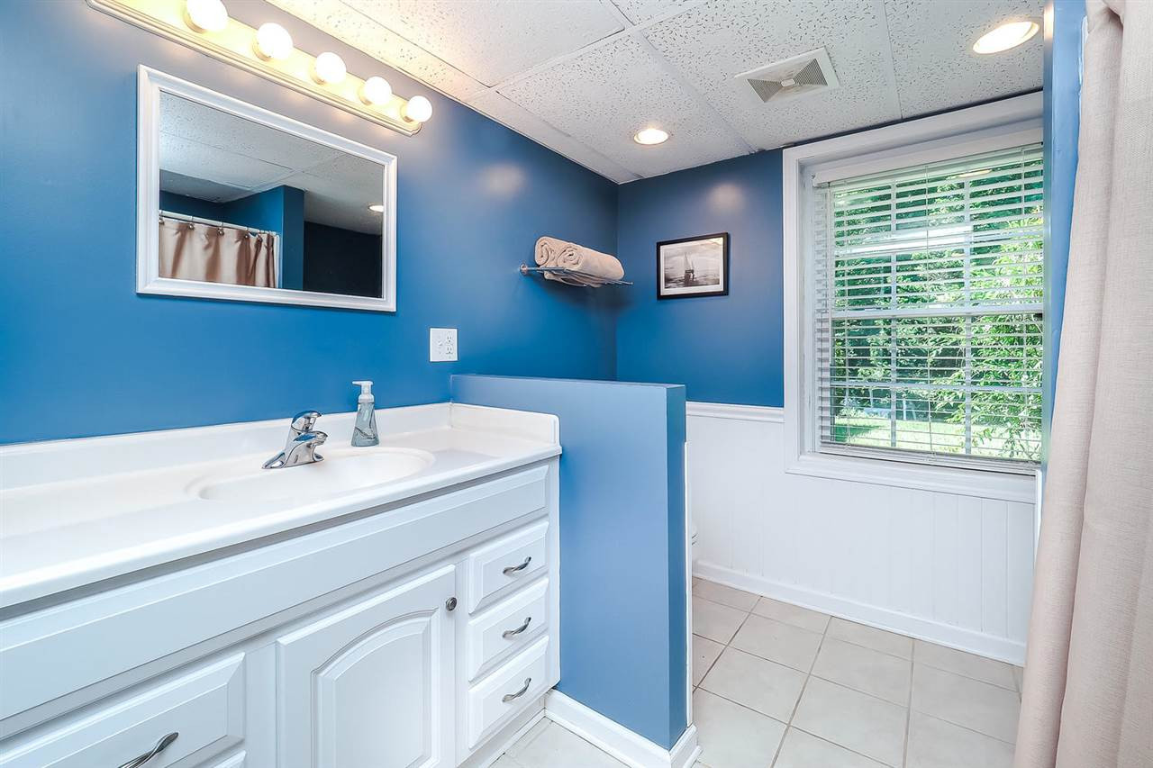 4911 Rembert Drive Raleigh, NC 27612 - Photo 18 of 22 Basement Full Bath