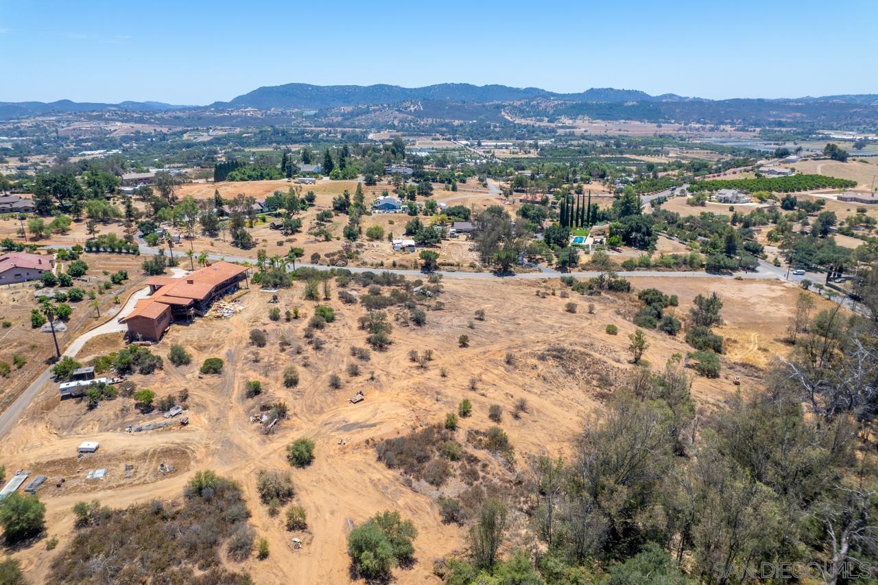15612 Fruitvale Road Valley Center, CA 92082 - Photo 20 of 33 an aerial view of residential house and sandy dunes