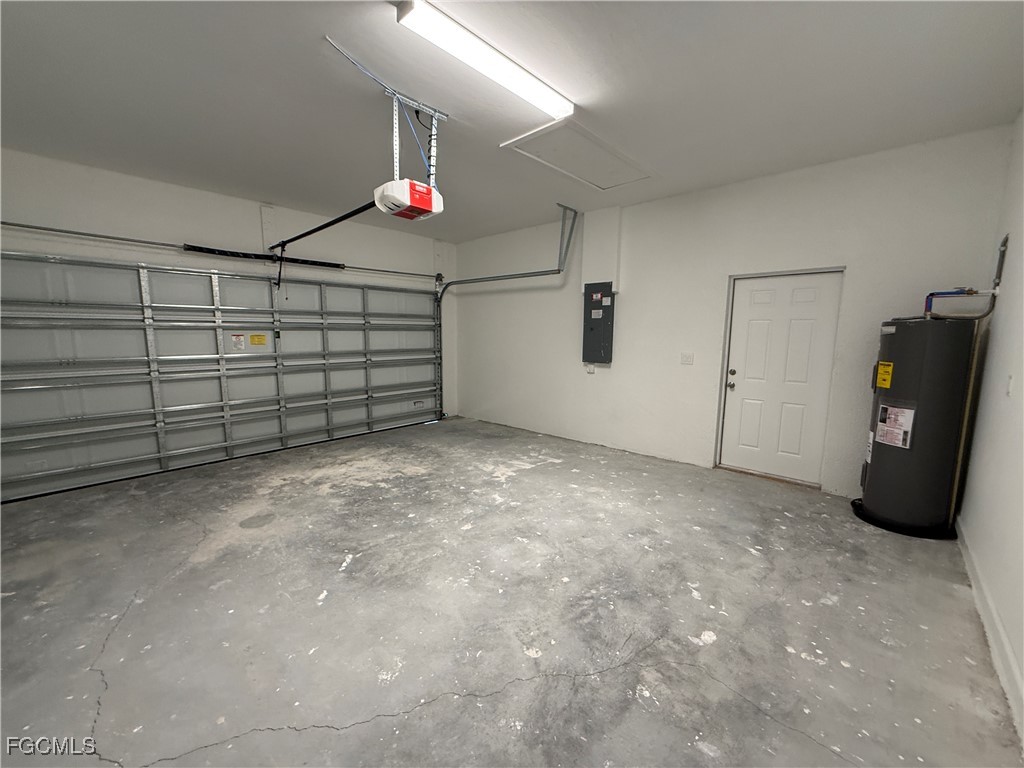 1853 Norma Court Lehigh Acres, FL 33972 - Photo 16 of 19 a view of a garage