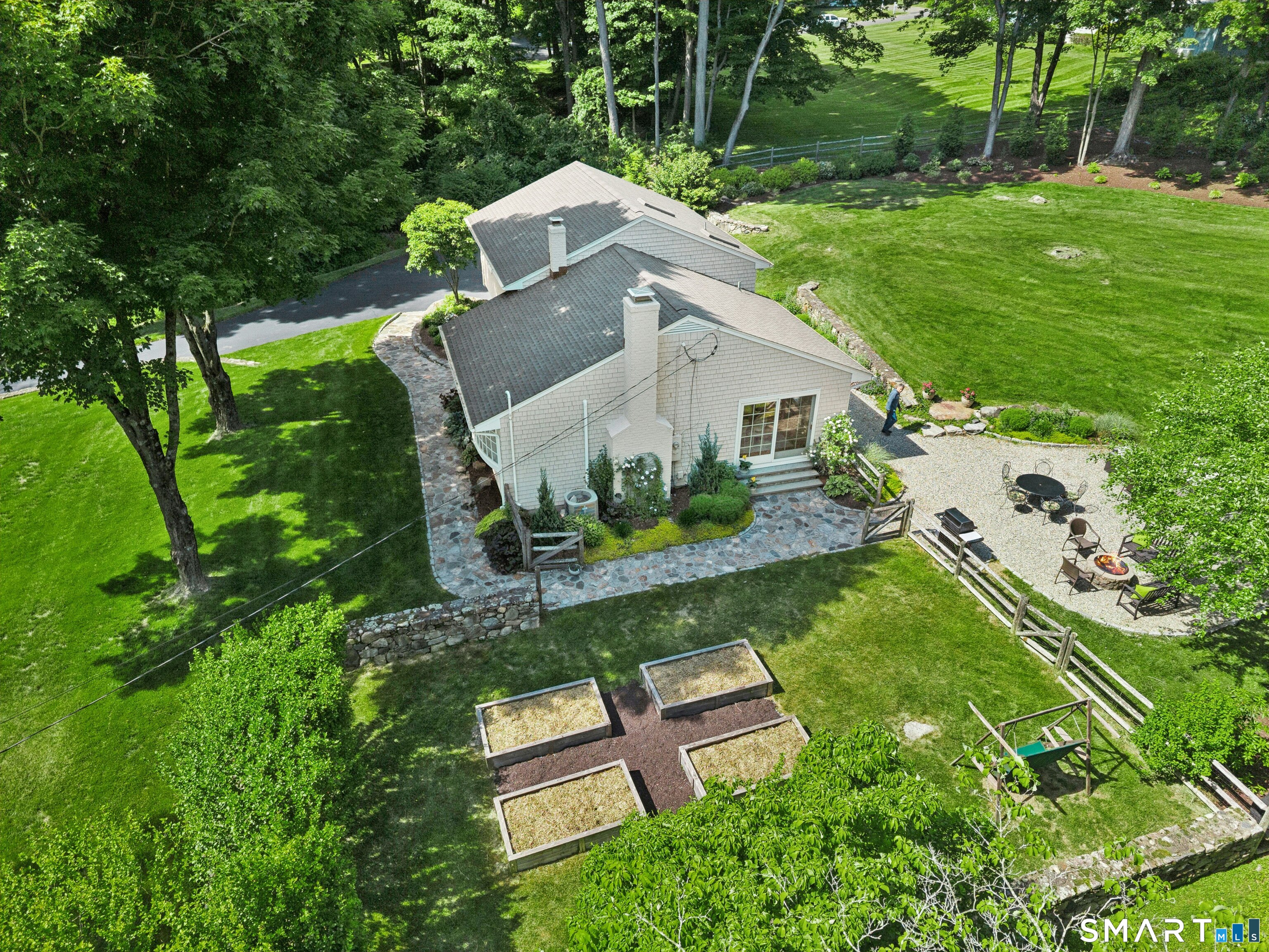 29 Old Farm Road Weston, CT 06883 - Photo 6 of 10 This side view shows the wonderful garden beds accessed from the Dining Room and some of the beautiful gardens/landscaping.