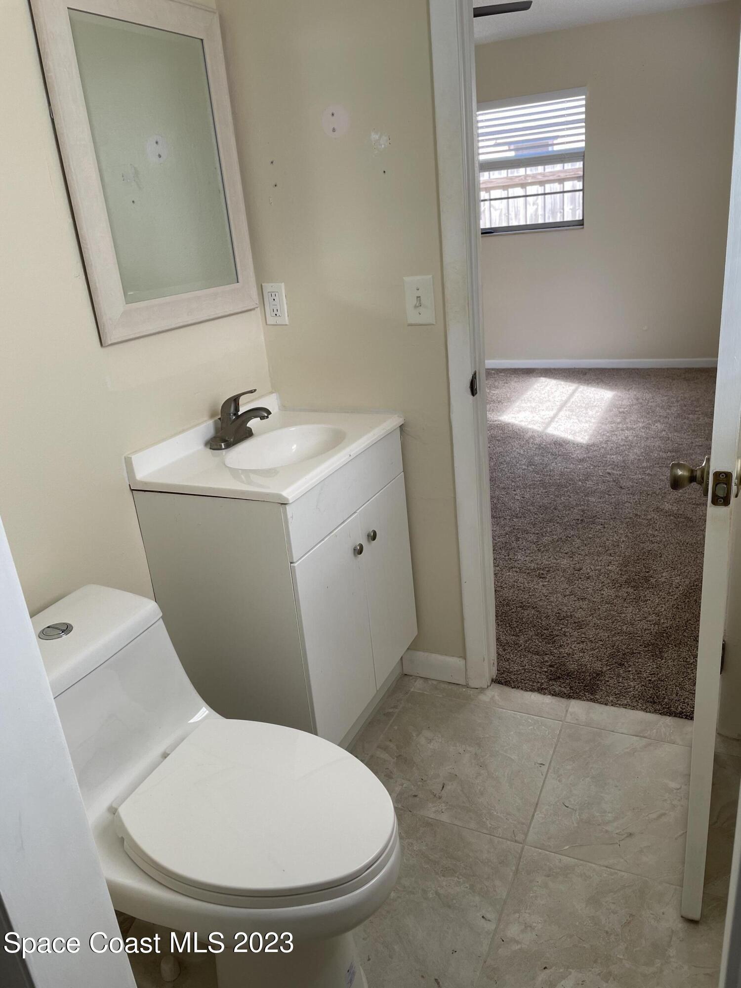 284 Sylvia Road Melbourne, FL 32904 - Photo 8 of 12 3E7E827D-1C9C-4332-91C6-36E0215BBB74