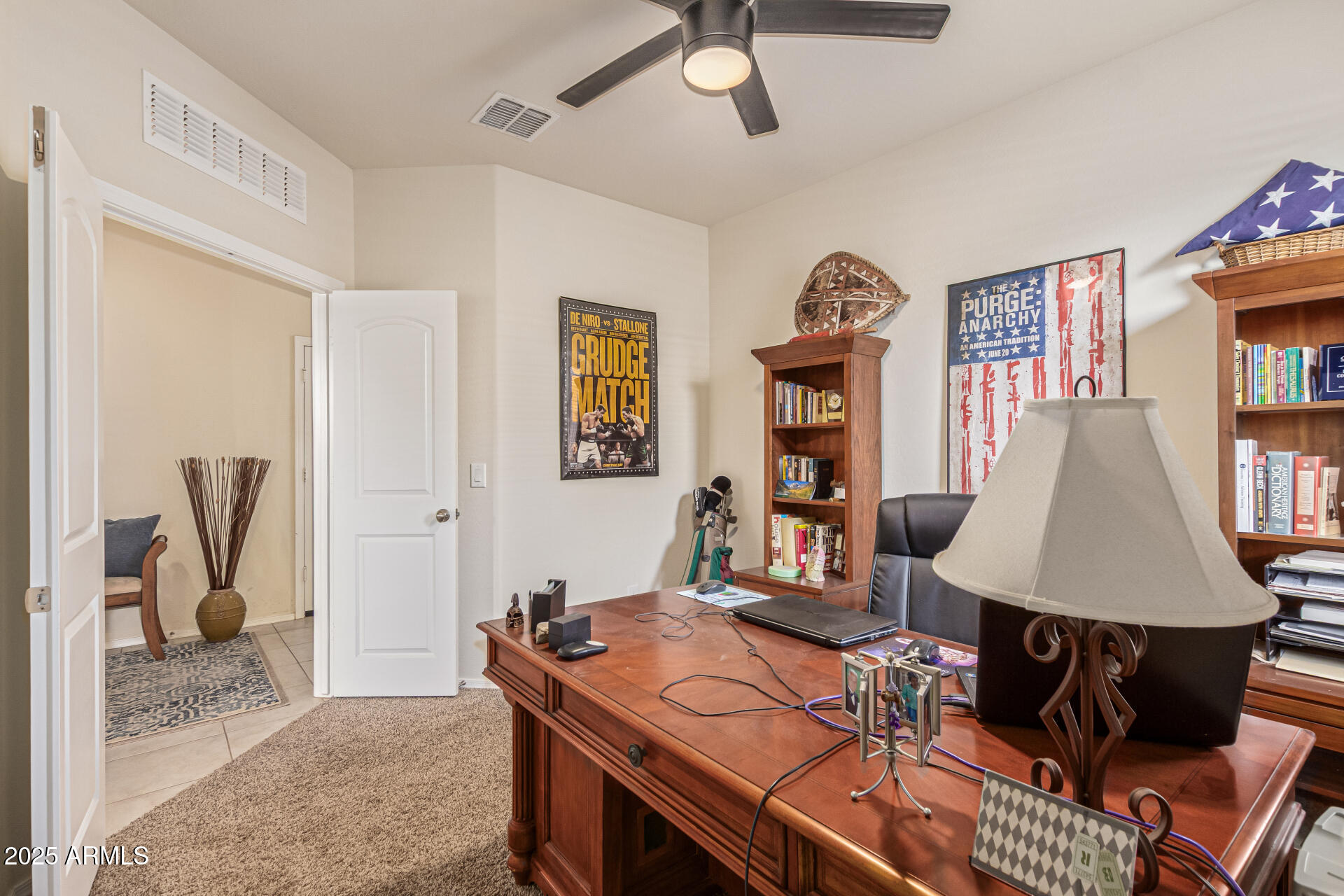 41844 West Rosa Drive Maricopa, AZ 85138 - Photo 15 of 47 a living room with furniture a clock and a window