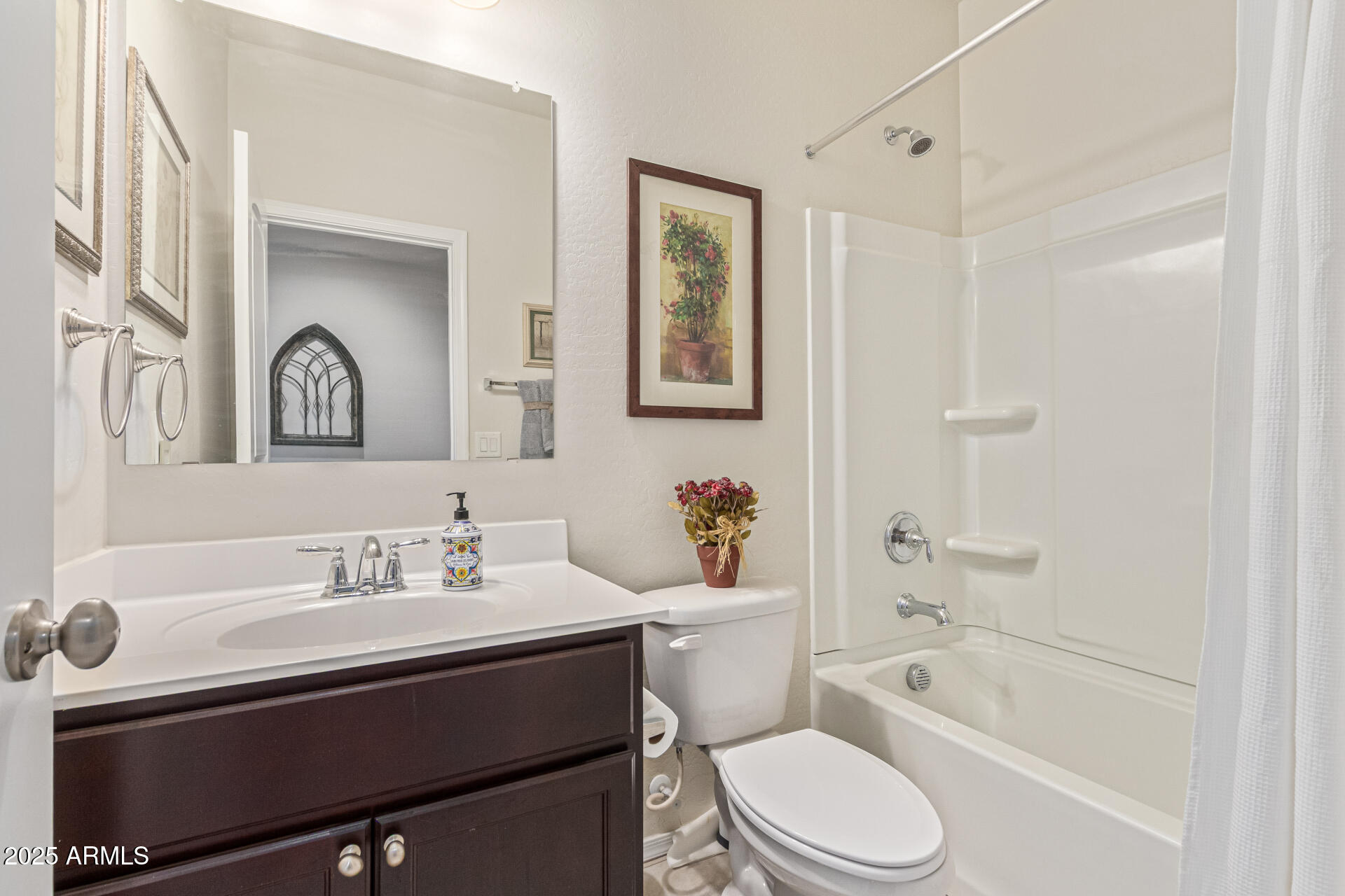 41844 West Rosa Drive Maricopa, AZ 85138 - Photo 16 of 47 a bathroom with a sink toilet and shower
