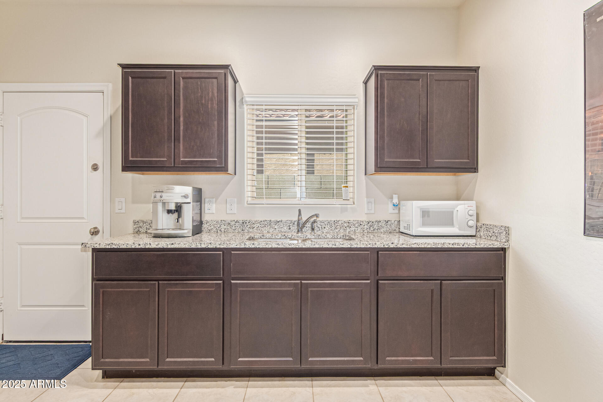 41844 West Rosa Drive Maricopa, AZ 85138 - Photo 34 of 47 a bathroom with a sink and a mirror