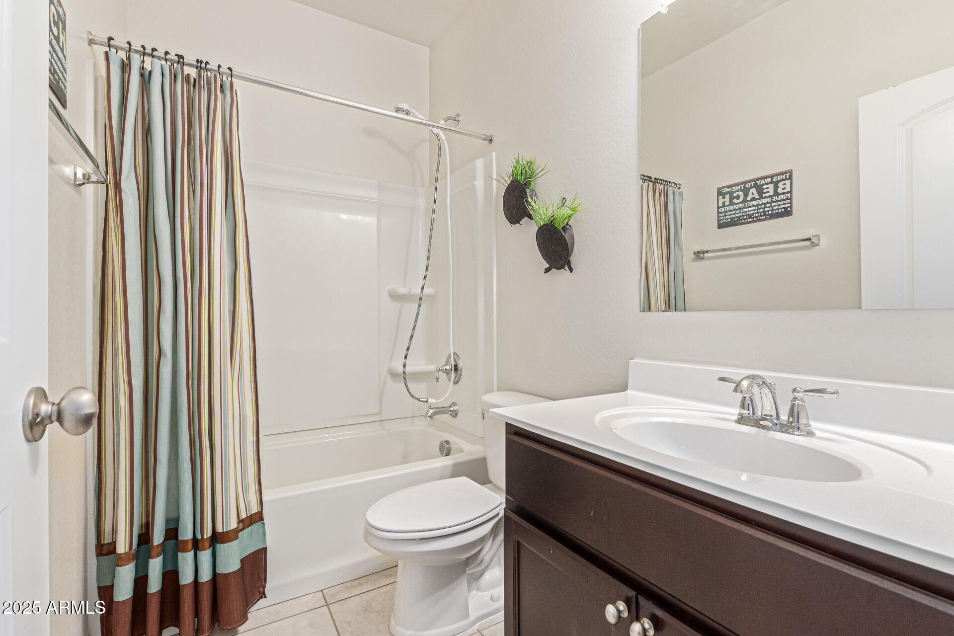 41844 West Rosa Drive Maricopa, AZ 85138 - Photo 35 of 47 a bathroom with a sink a toilet and shower