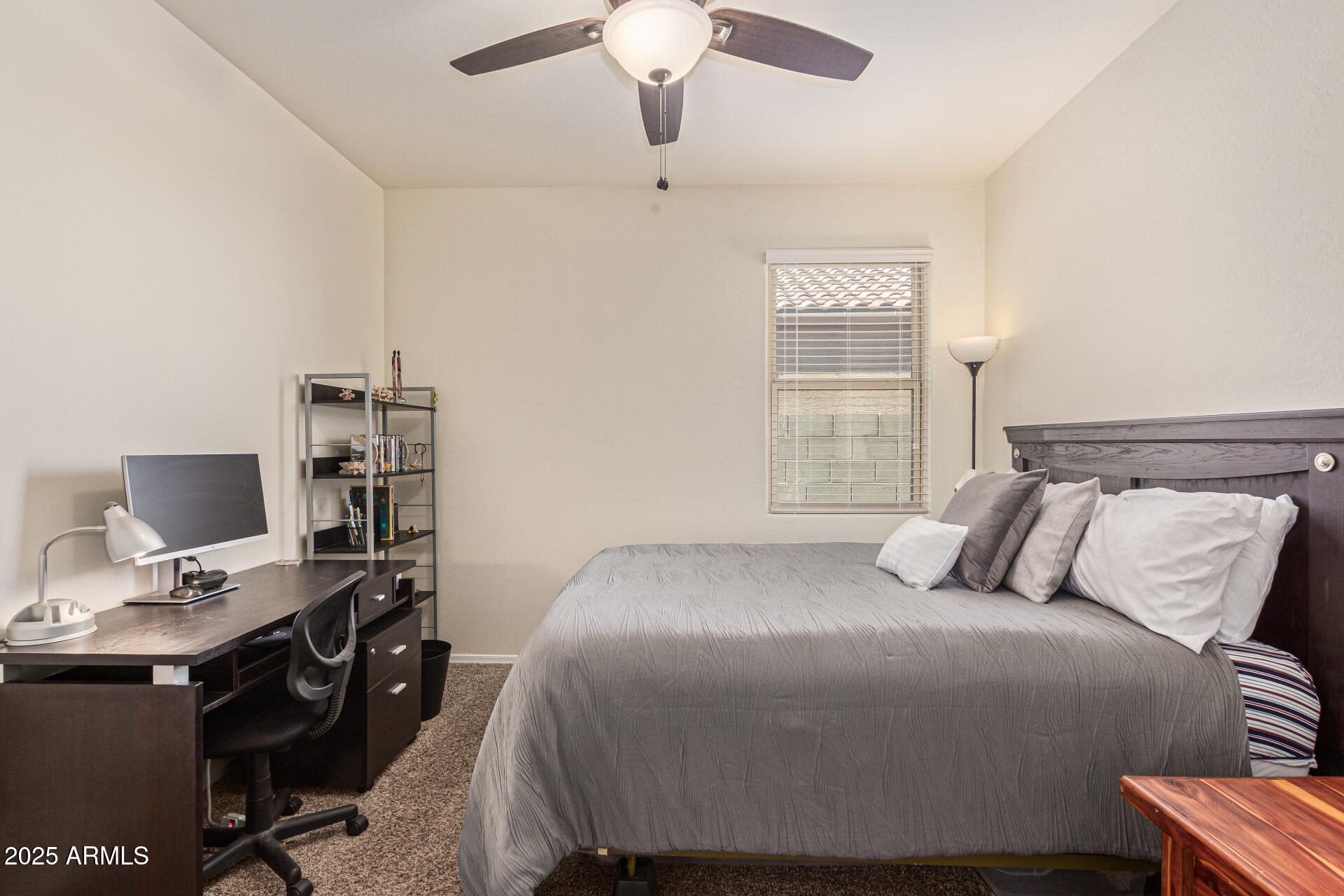 41844 West Rosa Drive Maricopa, AZ 85138 - Photo 38 of 47 a bedroom with a bed and a window