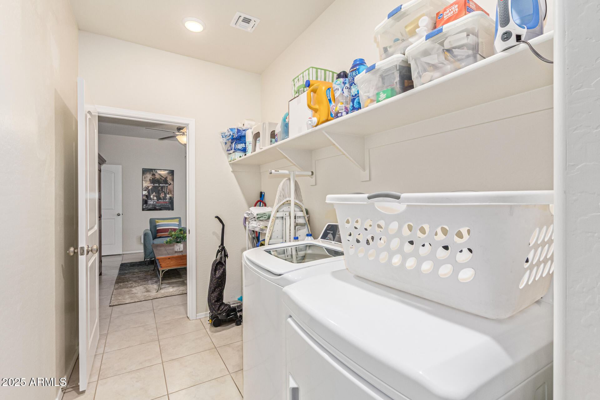 41844 West Rosa Drive Maricopa, AZ 85138 - Photo 40 of 47 a bathroom with a sink a toilet and a shower curtain