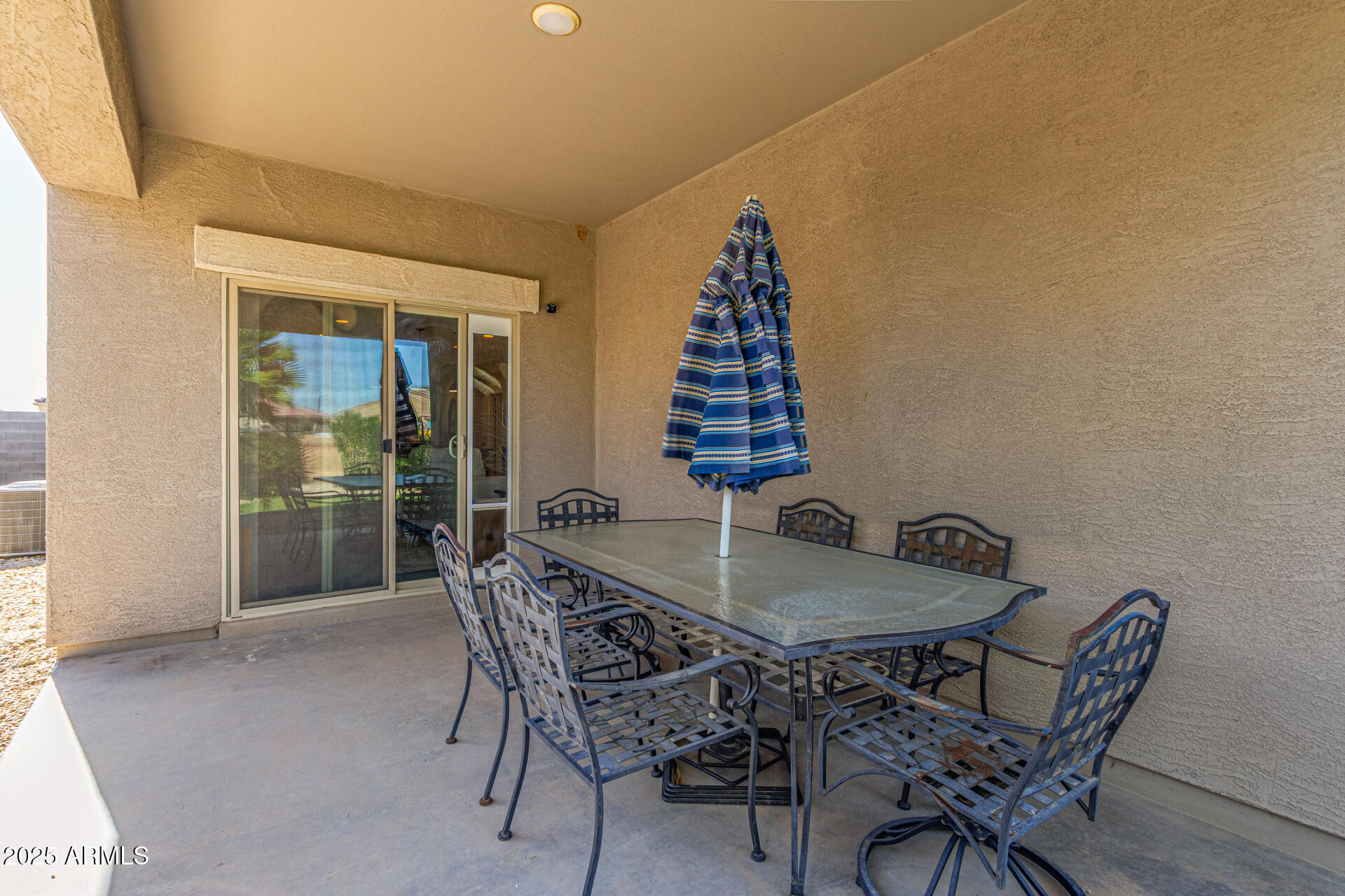 41844 West Rosa Drive Maricopa, AZ 85138 - Photo 43 of 47 a dining room with furniture and wooden floor