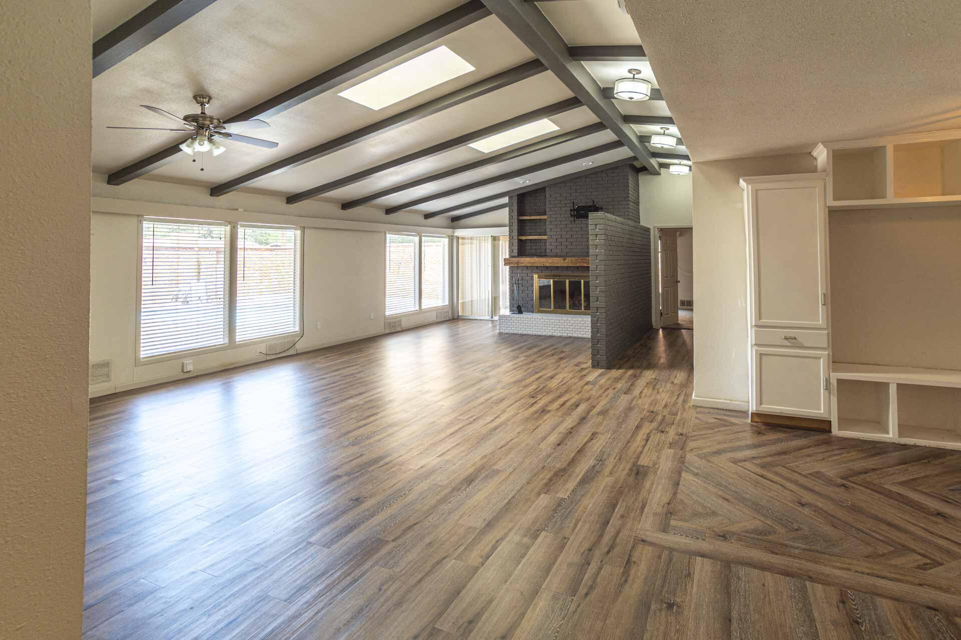 2136 57th Street Lubbock, TX 79412 - Photo 5 of 41 a view of empty room with wooden floor