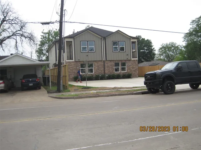a car parked in front of a house
