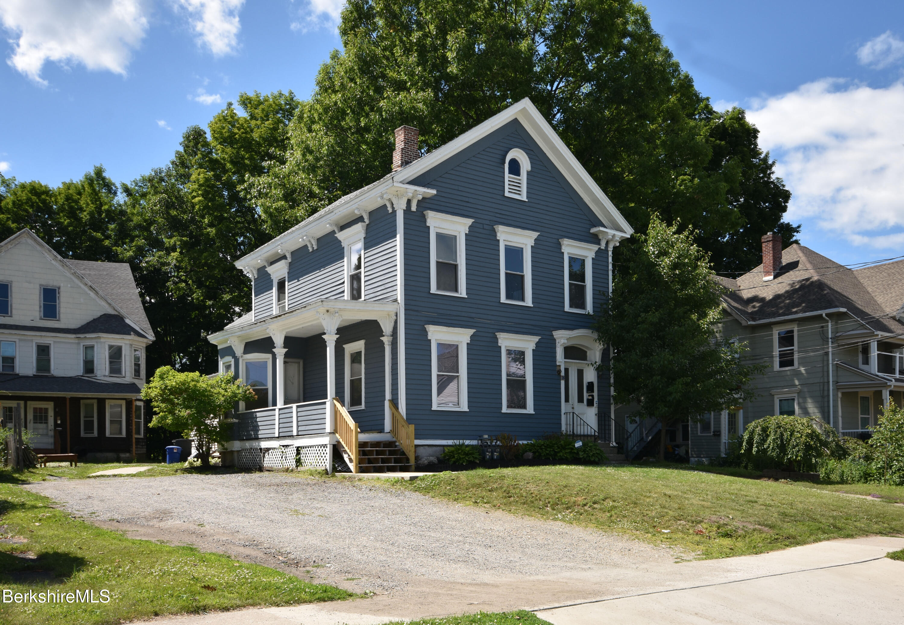 26 Elizabeth Street Pittsfield, MA 01201 - Photo 1 of 43 a front view of a house with a yard