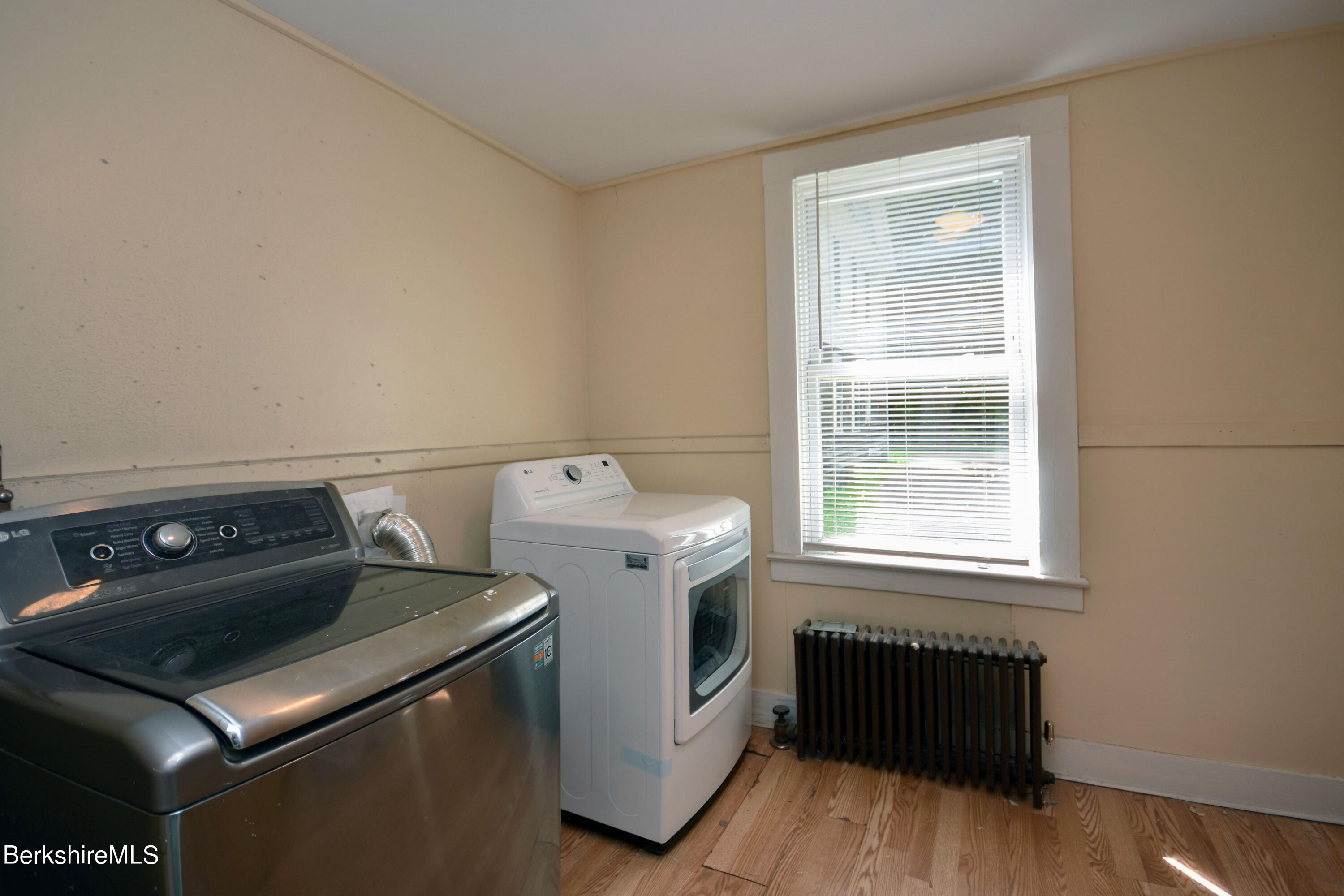 26 Elizabeth Street Pittsfield, MA 01201 - Photo 14 of 43 a utility room with dryer and washer