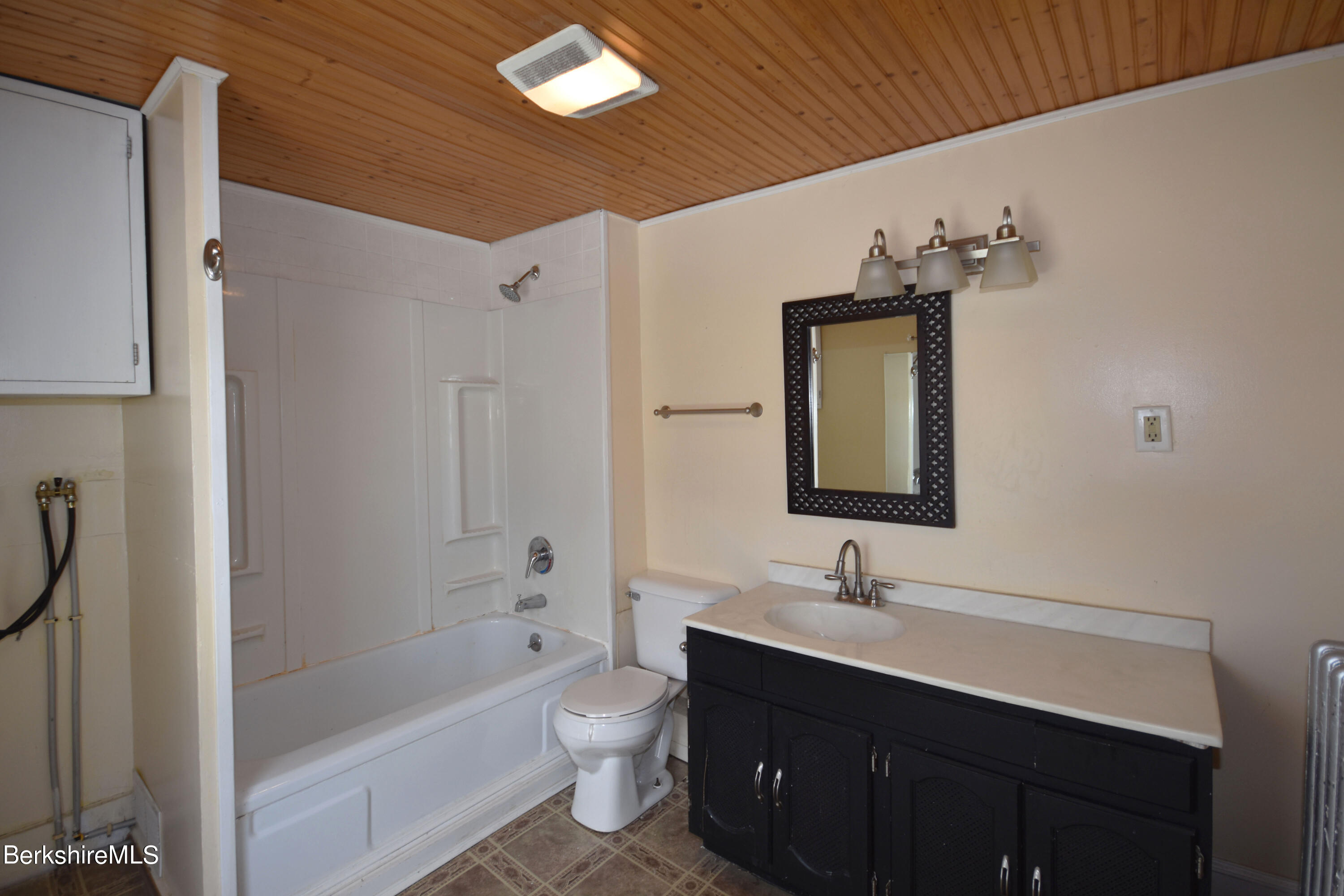 26 Elizabeth Street Pittsfield, MA 01201 - Photo 36 of 43 a bathroom with a sink a toilet and shower