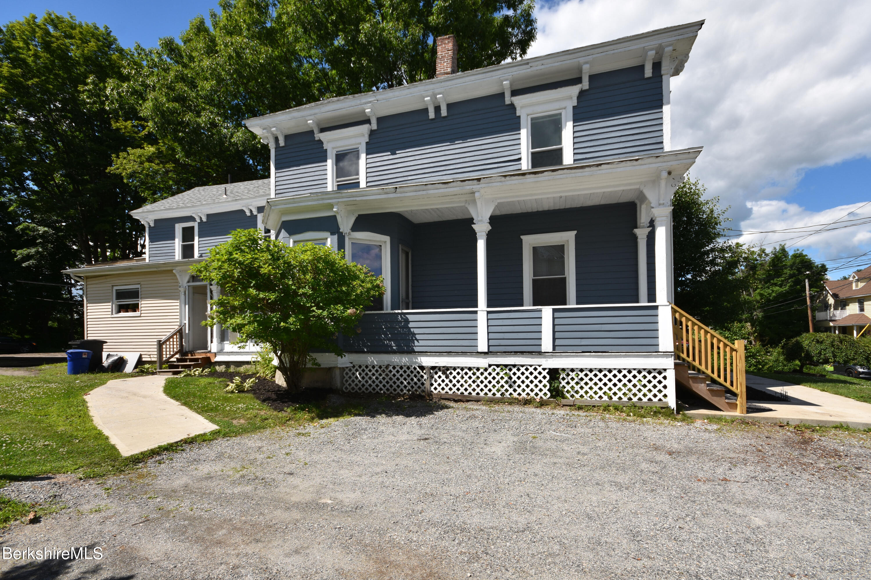 26 Elizabeth Street Pittsfield, MA 01201 - Photo 42 of 43 a front view of a house with a yard