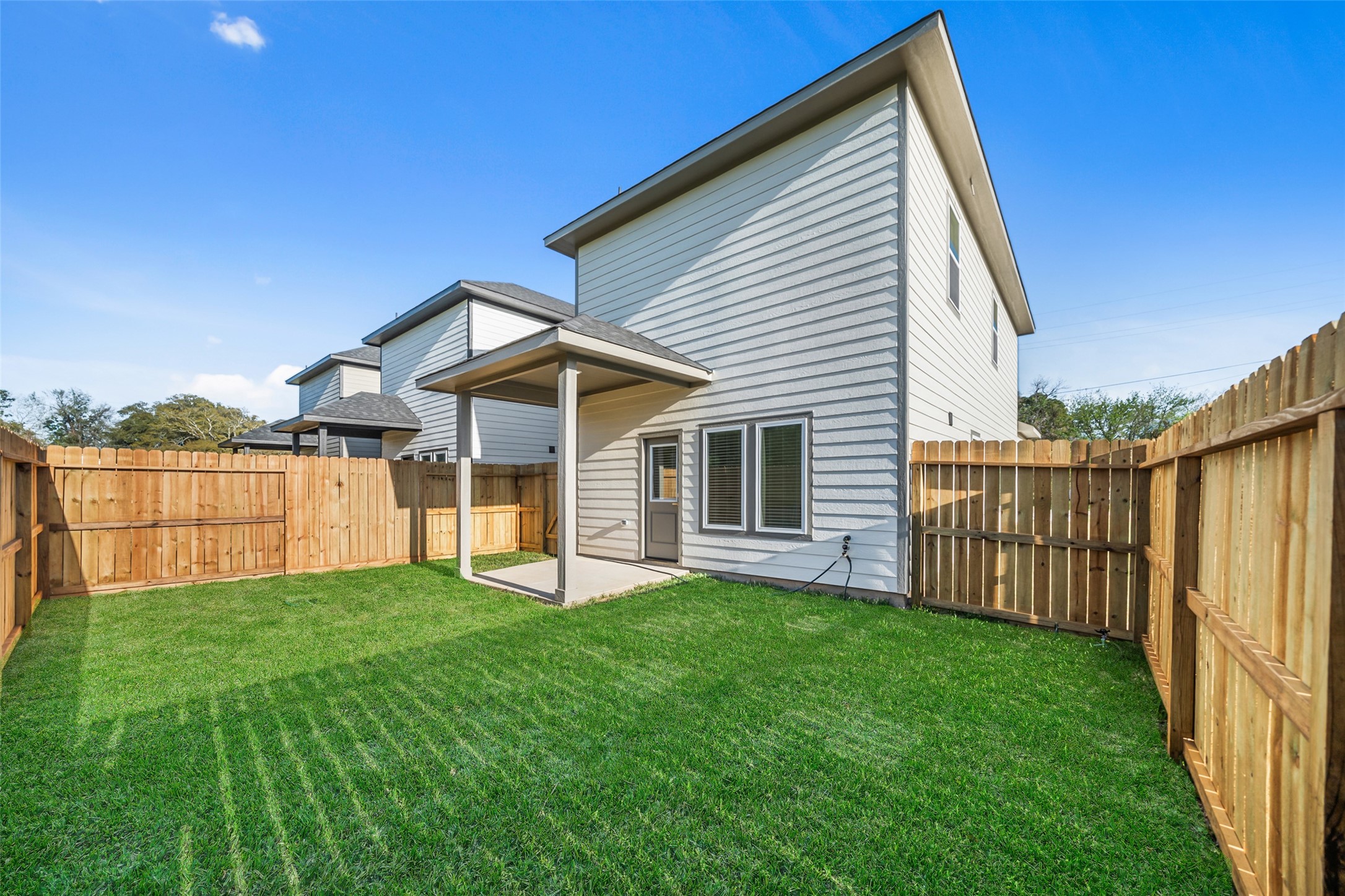 412 West Marlin Street Willis, TX 77378 - Photo 22 of 22 a view of a house with a yard and deck